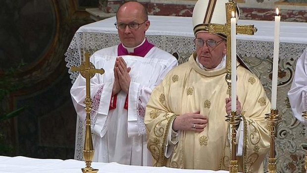 Newly elected Pope Francis I, Cardinal Jorge Mario Bergoglio of Argentina, leads a a mass with cardinals at the Sistine Chapel.