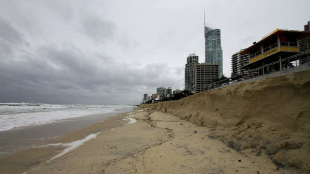 A photo from February 22 shows erosion of the beach at Surfers Paradise due to wild seas.