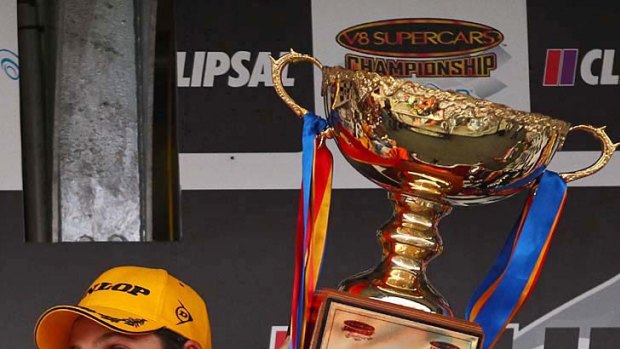 Whincup with the winner's cup.