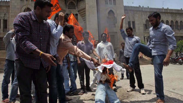 Border dispute inflames tensions: Protesters in Hyderabad burn an effigy during a protest demanding the withdrawal of Chinese troops from Indian territory last week.