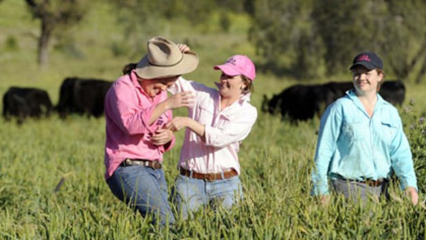 Cropping it sweet ... Anna, Emma and Eliza Redden, in the paddock of their Somerton property where they run the Triple A Angus Stud.