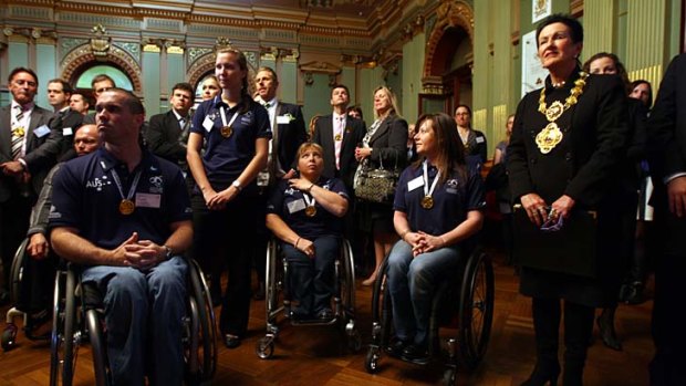 Warmed up &#8230; the Australian Paralympic team with the Sydney lord mayor, Clover Moore, right.