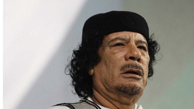 Defiant ... the charges laid against Gaddafi could fuel his determination to stay in power.