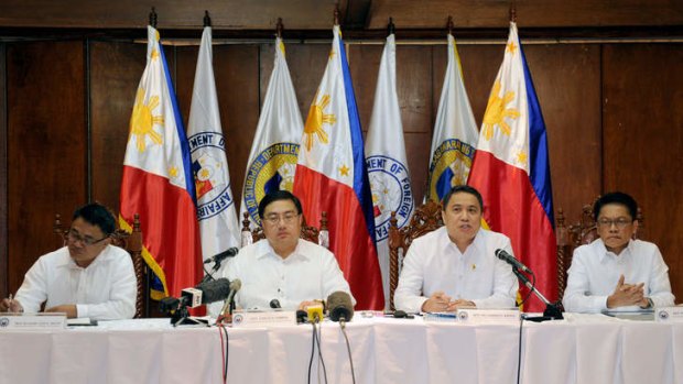 Philippine Defence Undersecretary Pio Lorenzo Batino (second right) speaks during a press conference at Camp Aguinaldo in Manila.