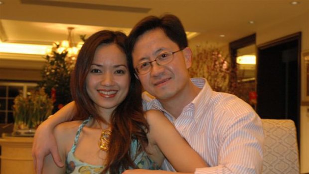 Jailed businessman Matthew Ng, pictured with his wife Niki Chow, broke down in a Chinese court yesterday.