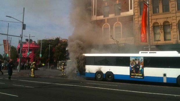 "Well alight" ... a bus carrying up to 40 people has caught fire