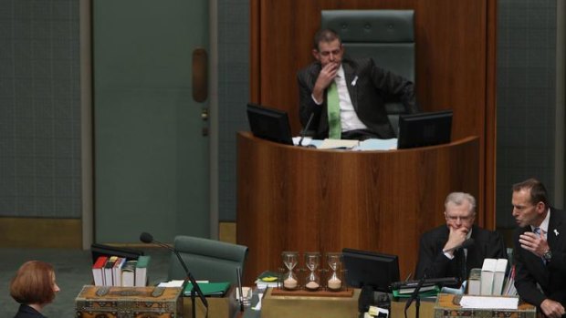 New Speaker of the House Peter Slipper presides over question time.