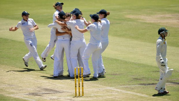 England celebrate after taking the wicket of Australia's Sarah Coyte during day four of the Women's Ashes Test at the WACA Ground in Perth.