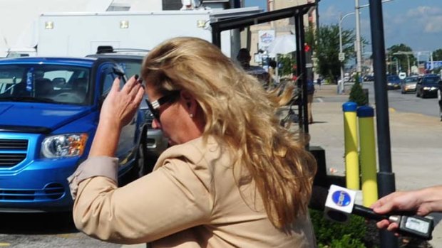 Paul Peters' ex-wife Deborah leaves the District Court in Louisville, Kentucky.
