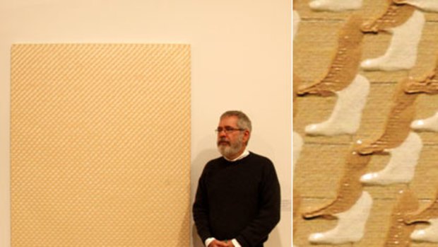 Infinity in the palm of your hand ... left, Leonard Brown with his Blake Prize-winning painting; and right, a detail from Brown's deceptively simple work.