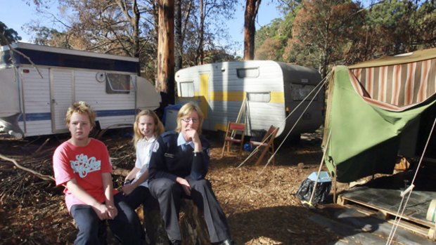 Kinglake's Tricia Hill with two of her children, Linden, 13, and Sancha, 12.