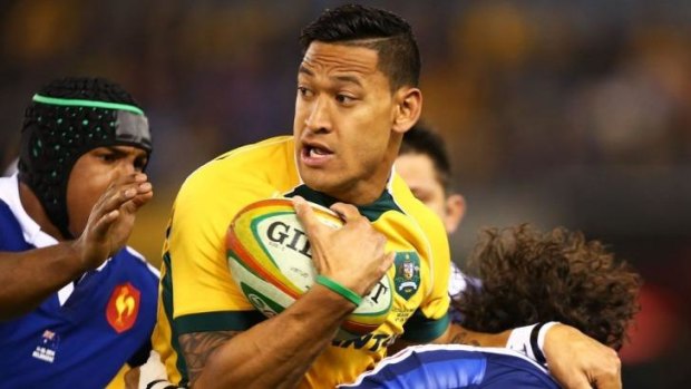 Wallabies fullback Israel Folau is rounded up by the French defence during the second Test in Melbourne.