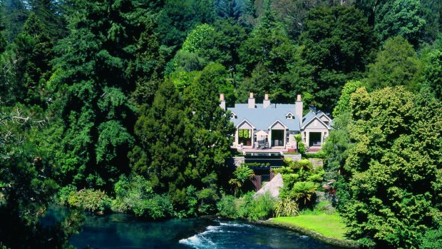 Huka Lodge sits on the banks  of the Waikato river.
