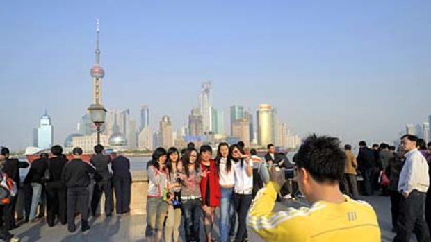 Set-up ... tourists get into the frame in Shanghai.