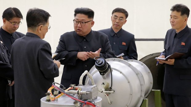 North Korean leader Kim Jong-un, centre, at an undisclosed location in North Korea..