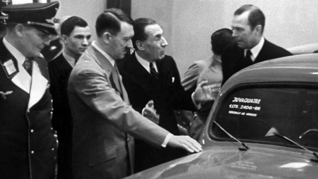 Berlin pitch ... Louis Renault (centre) presents a car built by his group to, from left, Luftwaffe chief Herman Goering and the leader of Nazi Germany, Adolf Hitler, in 1937.