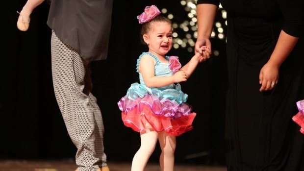 An unhappy Ballerina from Tiny Tutus during her recital at Turramurra High School hall. 