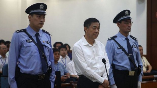 Found guilty:  Bo Xilai standing on trial in the Intermediate People's Court in Jinan.