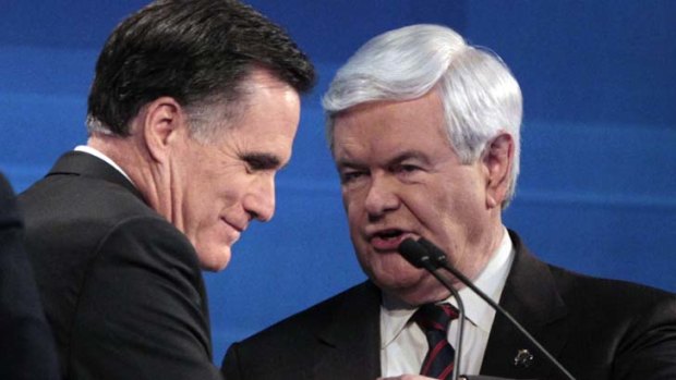 Mitt Romney and Newt Gingrich talk at the end of the South Carolina Republican presidential candidate debate earlier this month.