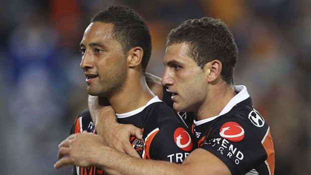 Playmakers ... Robbie Farah congratulates Benji Marshall on his opening-round try.