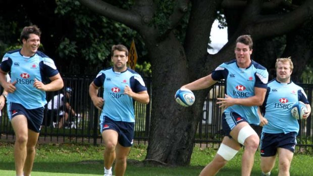 Backs against the wall &#8230; the Waratahs' back line looked jovial at training yesterday but it's very serious for the struggling Super Rugby side.