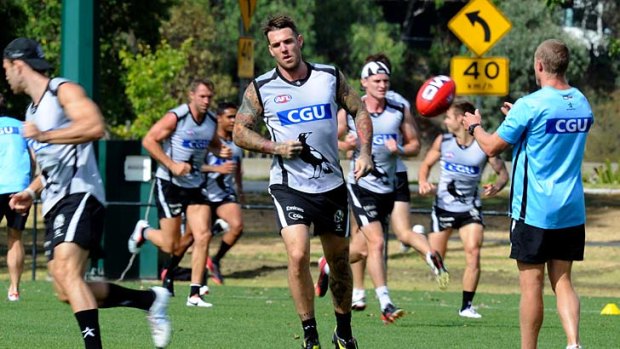 Pie and mighty: Collingwood star Dane Swan and teammates at training on Thursday.