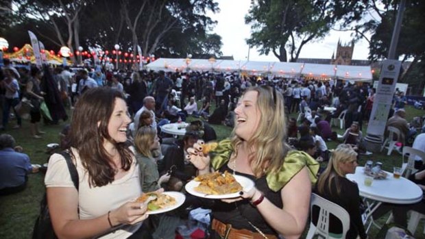 Tasty ... Sarah Caskey, left, and Meagan McLachlan at the night noodle markets in Hyde Park.