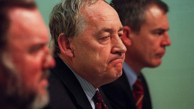 The brutal reality ... Carlton's contingent reacts to the penalties after they were announced in 2002.