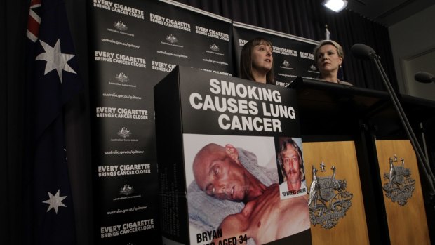 Fight to the last breath: then Labor attorney-general Nicola Roxon and health minister Tanya Plibersek respond to news of a High Court challange to their plain-packaging laws in 2012. 