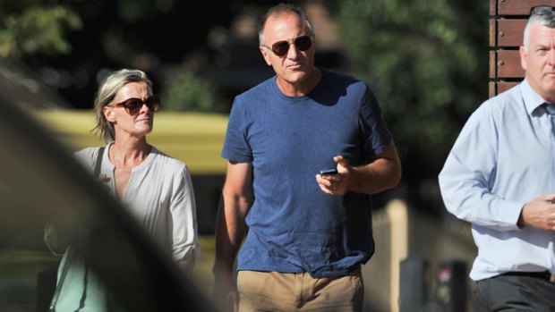 Tim and Susie Watson, parents of Essendon skipper Jobe, arrive for a management meeting at Essendon in February.
