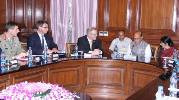 Immigration Minister Scott Morrison (third from left) and Lieutenant-General Angus Campbell (left) meet with Indian Home Minister Rajnath Singh (second from right) and External Affairs Minister Sushma Swaraj (right) in Delhi on Tuesday.