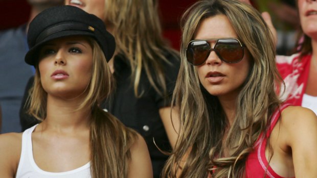 Supportive ... Victoria Beckham, right, got to know Cheryl Cole at World Cup 2006 in Germany.