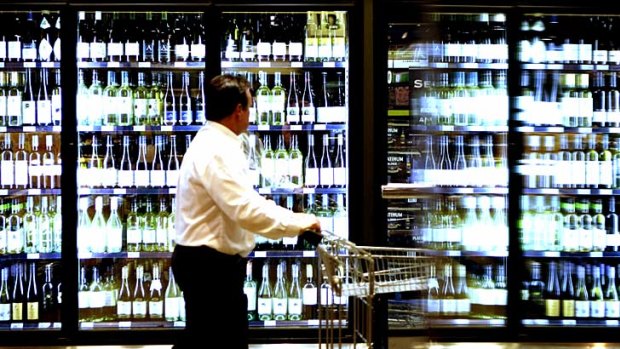 Coles and Woolworths in Alice Springs will not sell any two-litre cask wine from Friday.