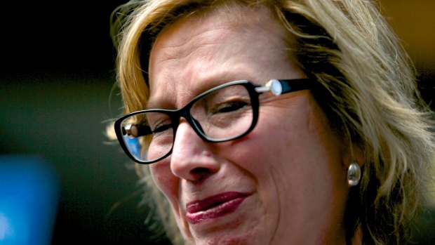 Rosie Batty was distraught speaking with reporters outside the Coroner's Court.