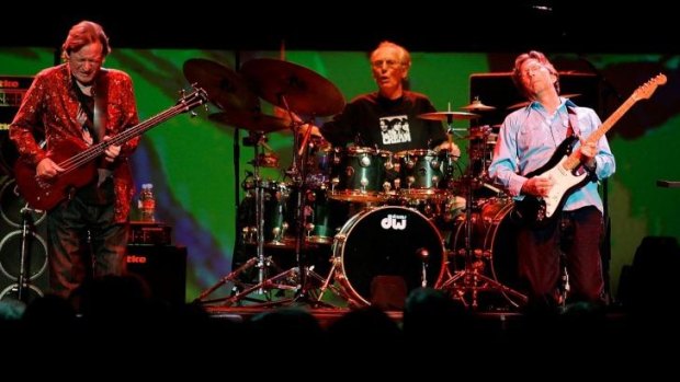 Legendary supergroup Cream (from left) bass player Jack Bruce, drummer Ginger Baker and Eric Clapton perform during a concert at the Royal Albert Hall in London in 2005.