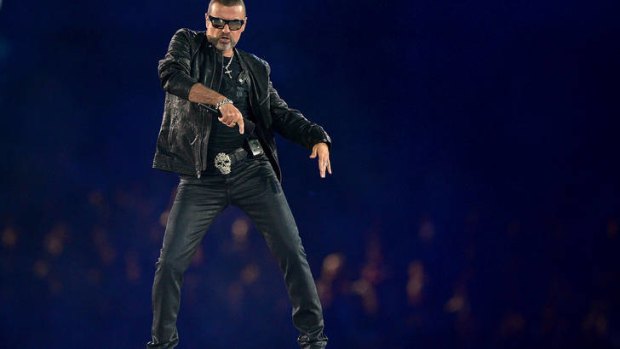 George Michael performs at the Olympic Games closing ceremony.