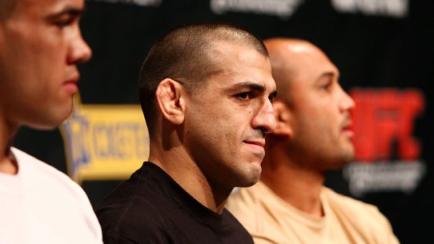George Sotiropoulos (centre) in a UFC press conference alongside fellow Australian James Te Huna (left) and former UFC lightweight and welterweight champion, BJ Penn.