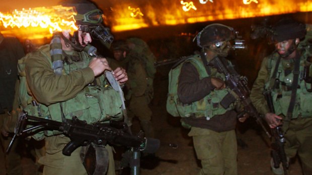 Israeli troops mobilise on the Gaza/Israel border.