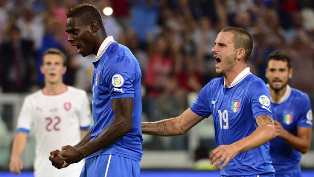 Italian forward Mario Balotelli (left) celebrates after scoring from a penalty in the match against the Czech Republic.