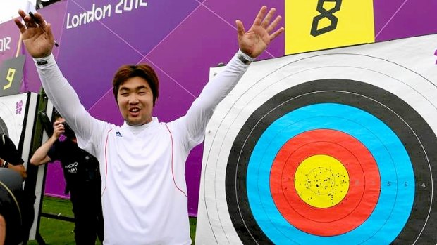 Korean archer Im Dong-Hyun celebrates his new world record in the men's individual ranking round at Lord's.