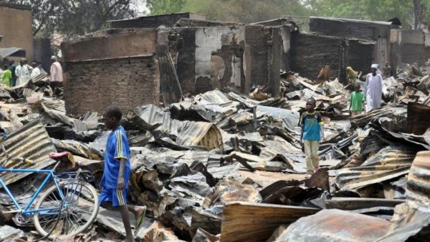 Boko Haram militants were suspected of burning shops in the market at Ngala in Borno state in May. 