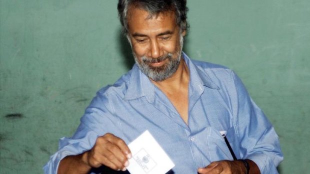 East Timor independence leader Xanana Gusmao votes in the country's first democratic elections on August 30, 2001.