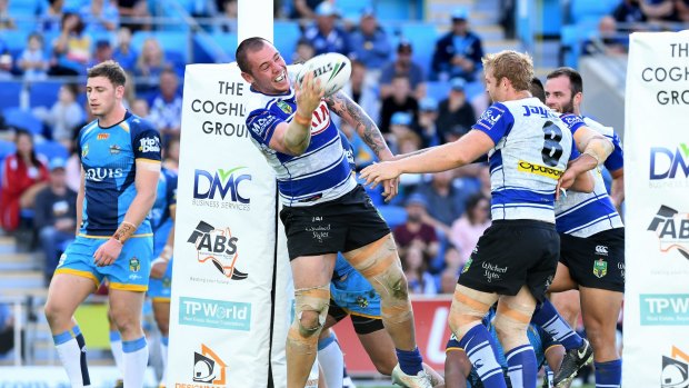 Consolation victory: David Klemmer celebrates after scoring against the Titans.