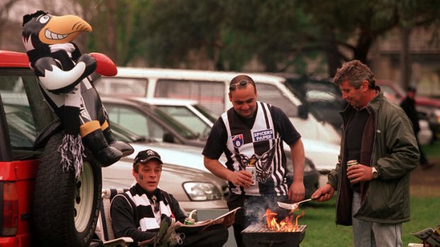 Fans cook up a feast outside the MCG prior to the 2002 grand final.