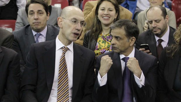 Adam Silver, the new NBA Commissioner, talks with Sacramento Kings majority owner Vivek Ranadive as the Kings play the Toronto Raptors in Sacramento on Wednesday.