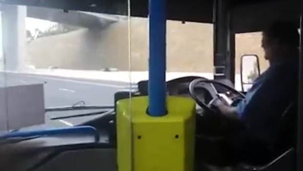 The driver was caught on camera looking at his phone, rather than the road.