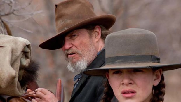 Jeff Bridges and Hailee Steinfeld (R)  in a scene from the film 'True Grit' directed by Ethan Coen.