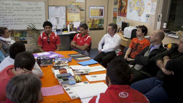 Mind hub ... Sydney Swans  Byron Sumner, Lewis Jetta and Adam Goodes discuss Big Picture ideas with youth workers, students and teachers from Sydney Secondary College.
