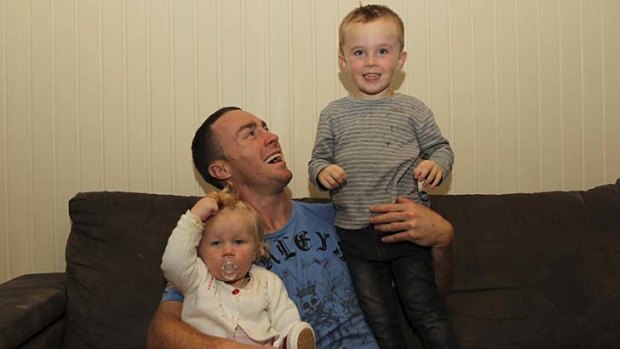 Family approval: James Maloney's son, Kade and daughter, Layla greet their father's news of inclusion in the Blues Origin squad with excitement at their family home on Sunday.