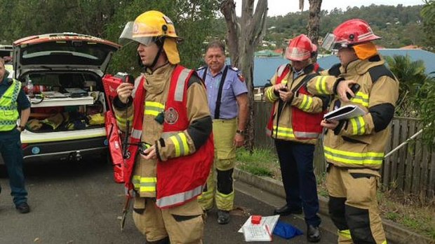 Firefighters arrive at the scene of a blaze at Mitchelton State School.